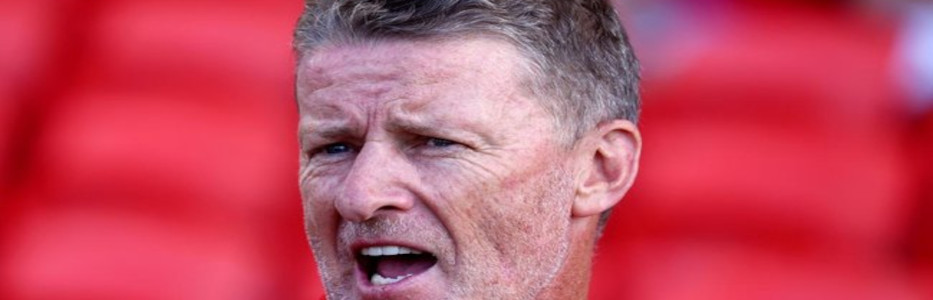 Suns coach says Opie will continue duties despite AFL probe